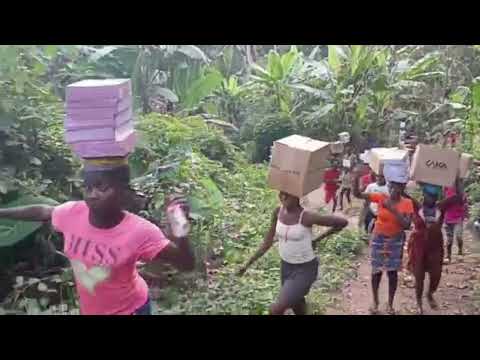 Carrying a library over the hills in Ghana