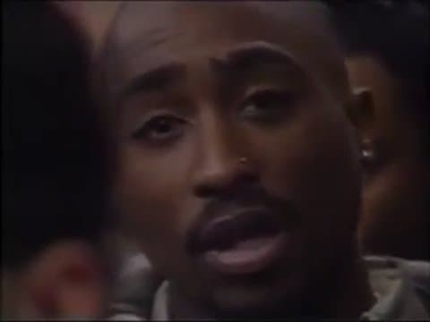 Facing the cameras outside the New York trial