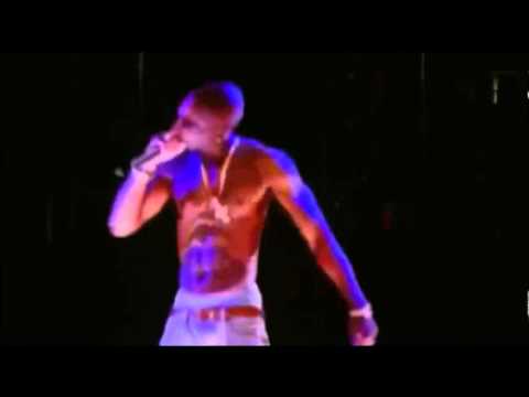 Projected on stage at Coachella beside Snoop Dogg