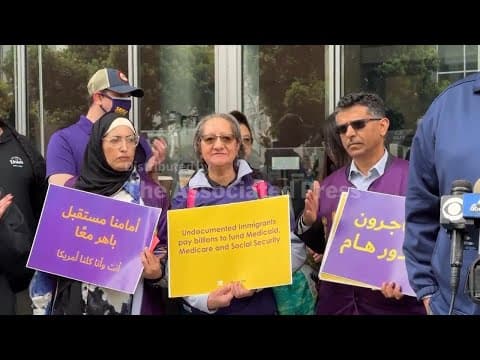Union leaders denounce immigration raids at downtown rally