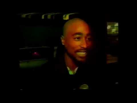 Television news reports the Quad Studios shooting