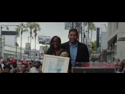 Receiving a star on the Hollywood Walk of Fame