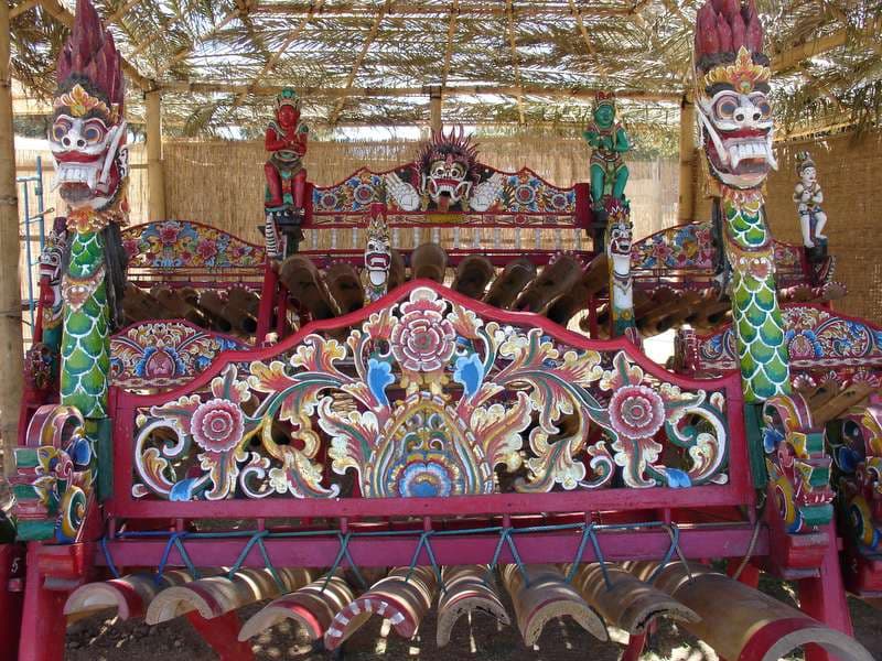 Carved Balinese gamelan set under thatch, Boom 2006