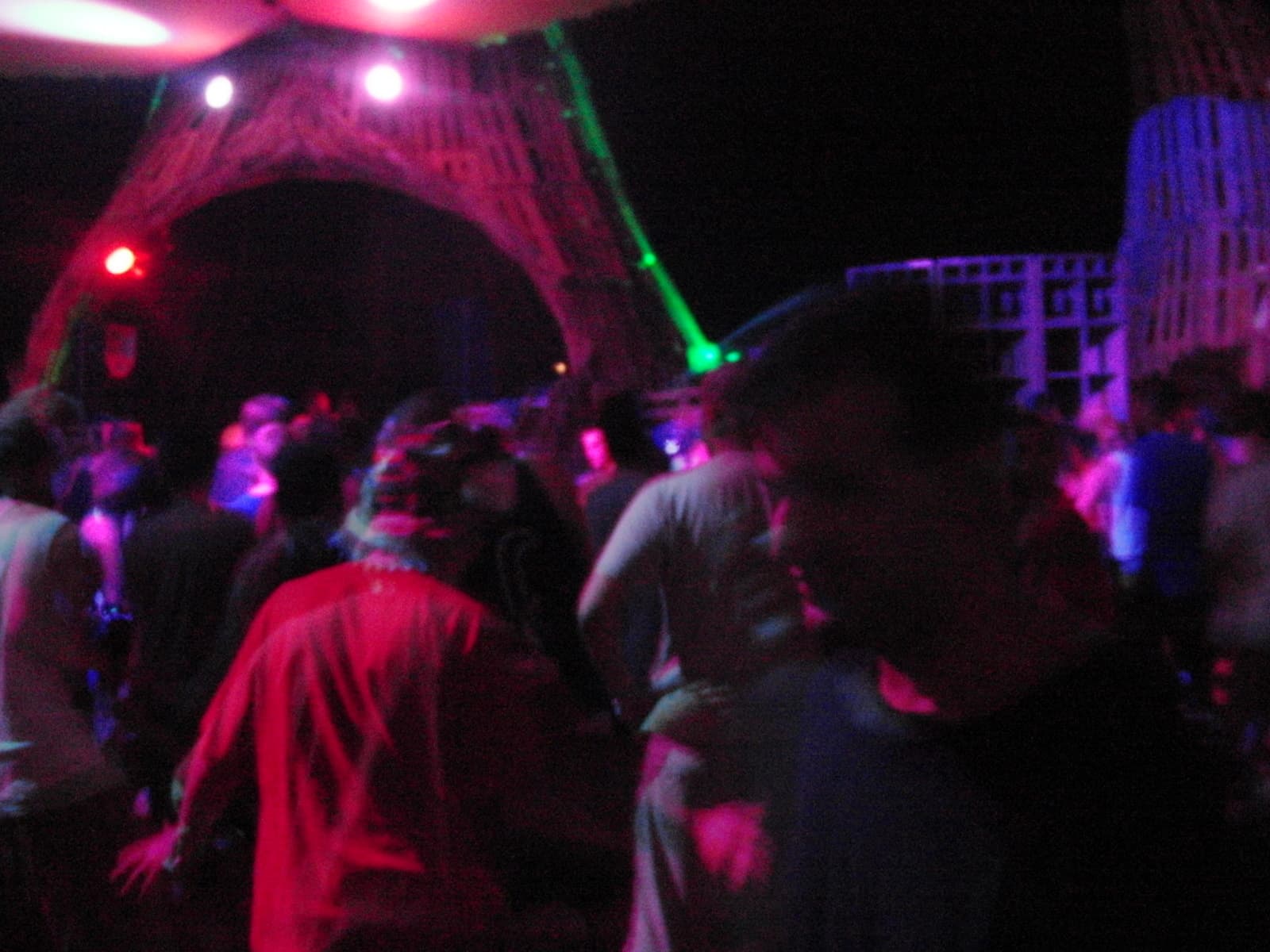 Dancing under the lit temple arch at night, Boom 2010