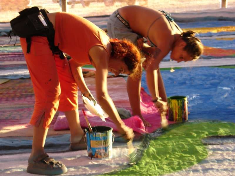 Painters coating ground artwork panels, Boom 2006