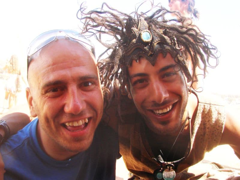Two visitors posing together