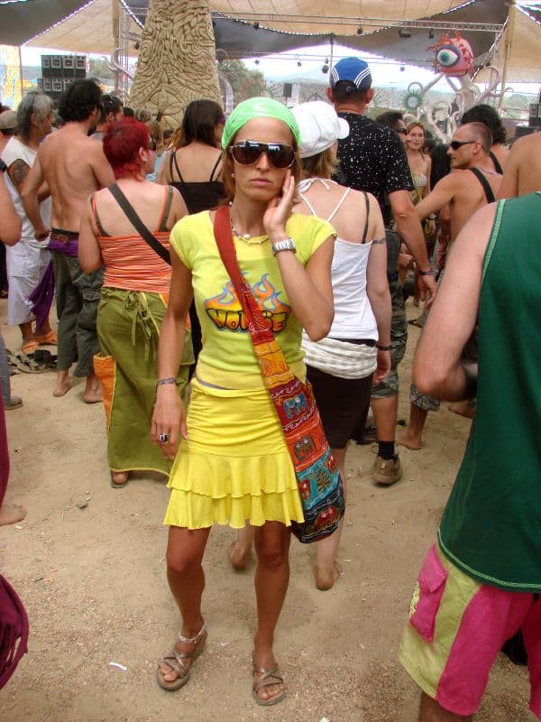 Visitors crossing a busy path in costume