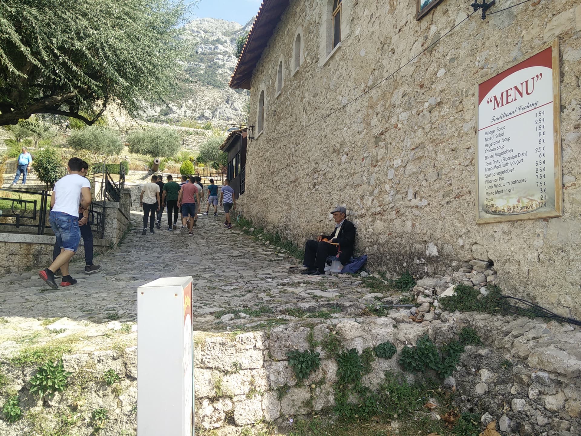 An old man playing çifteli at the Skanderbeg Museum in Kruja