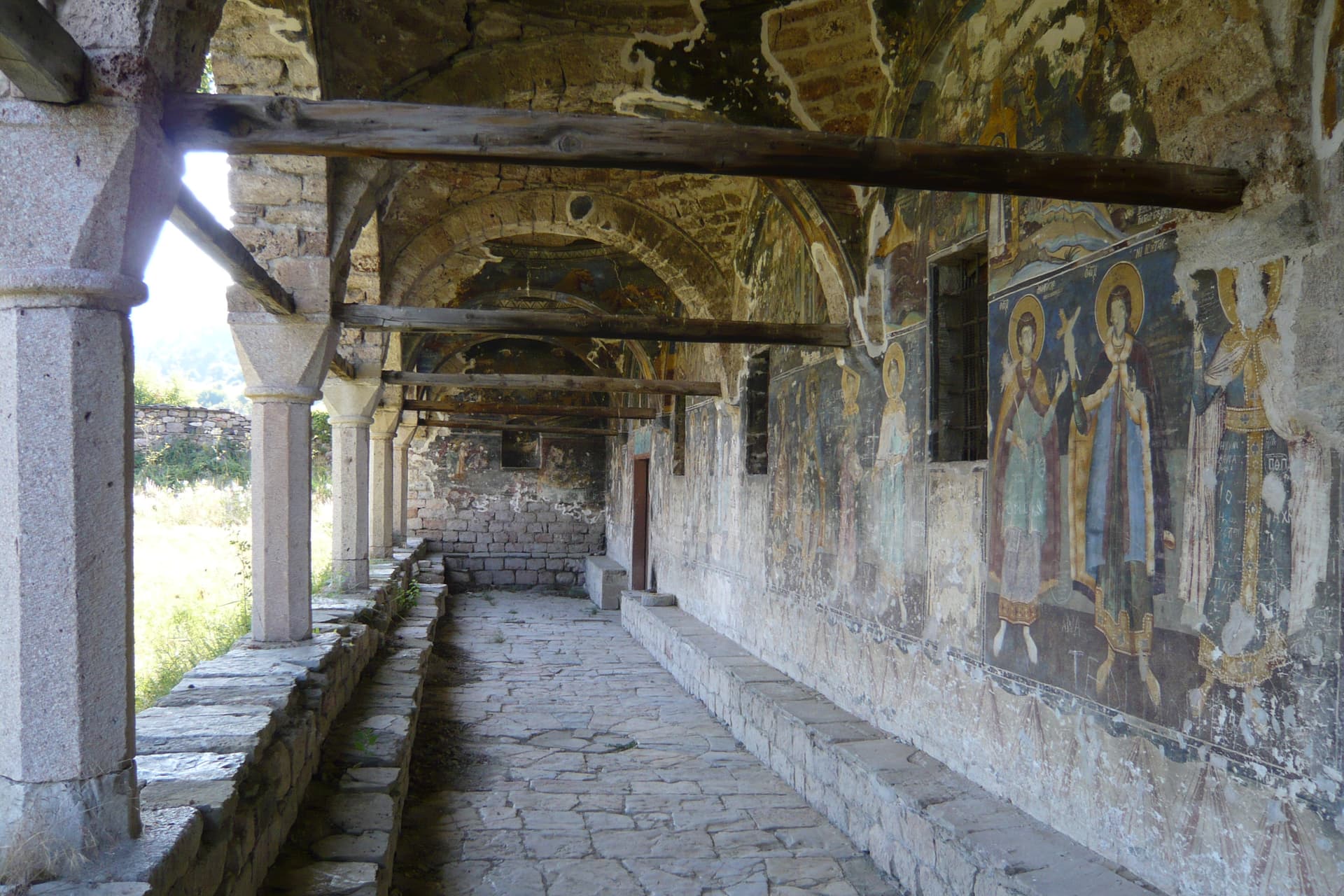 Voskopojë St Athanasius church exterior with frescoes