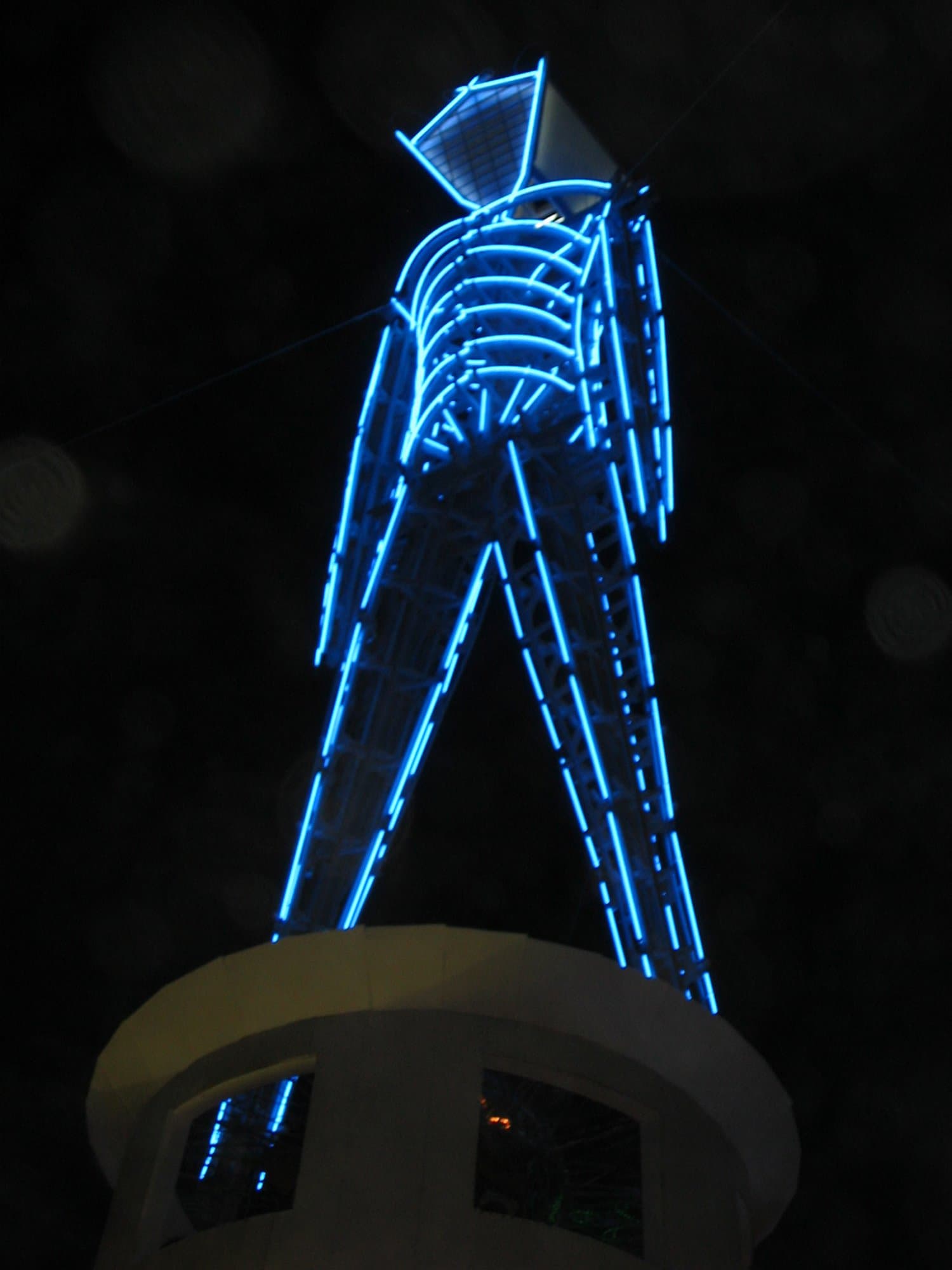 The blue-neon Man on the lighthouse · 5/5