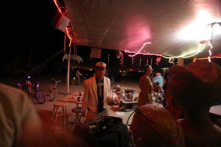 Sunset over the tent city · 1/9