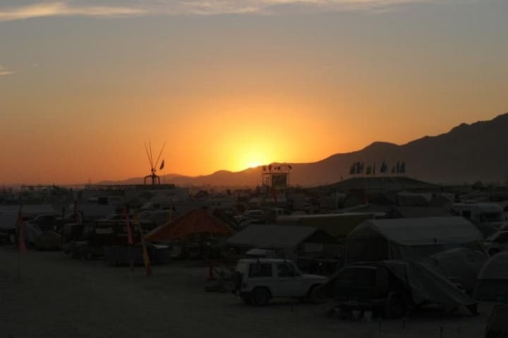 Sunset over the tent city · 5/9