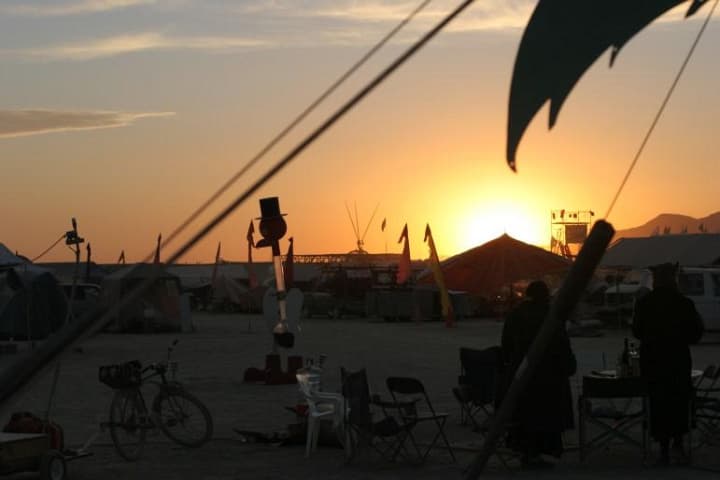Sunset over the tent city · 6/9
