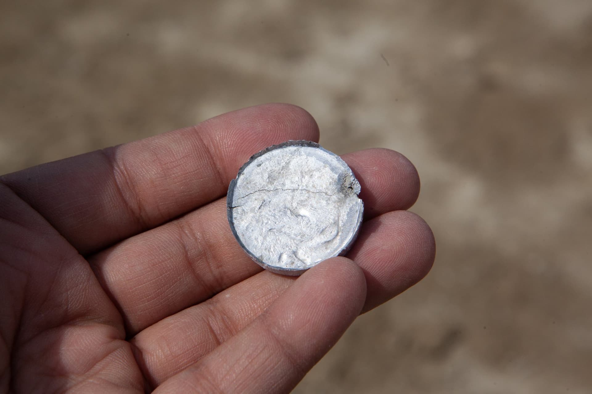 The coin-press camp · 5/14