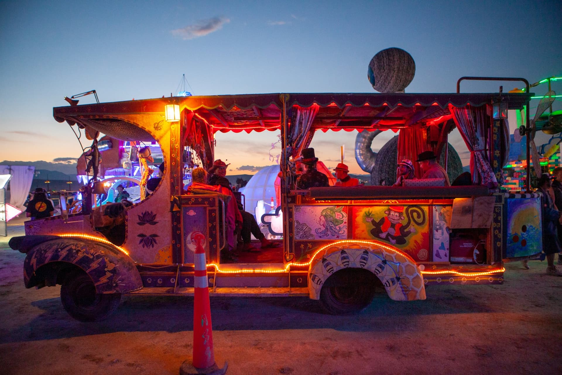 The neon art cars at night · 7/15