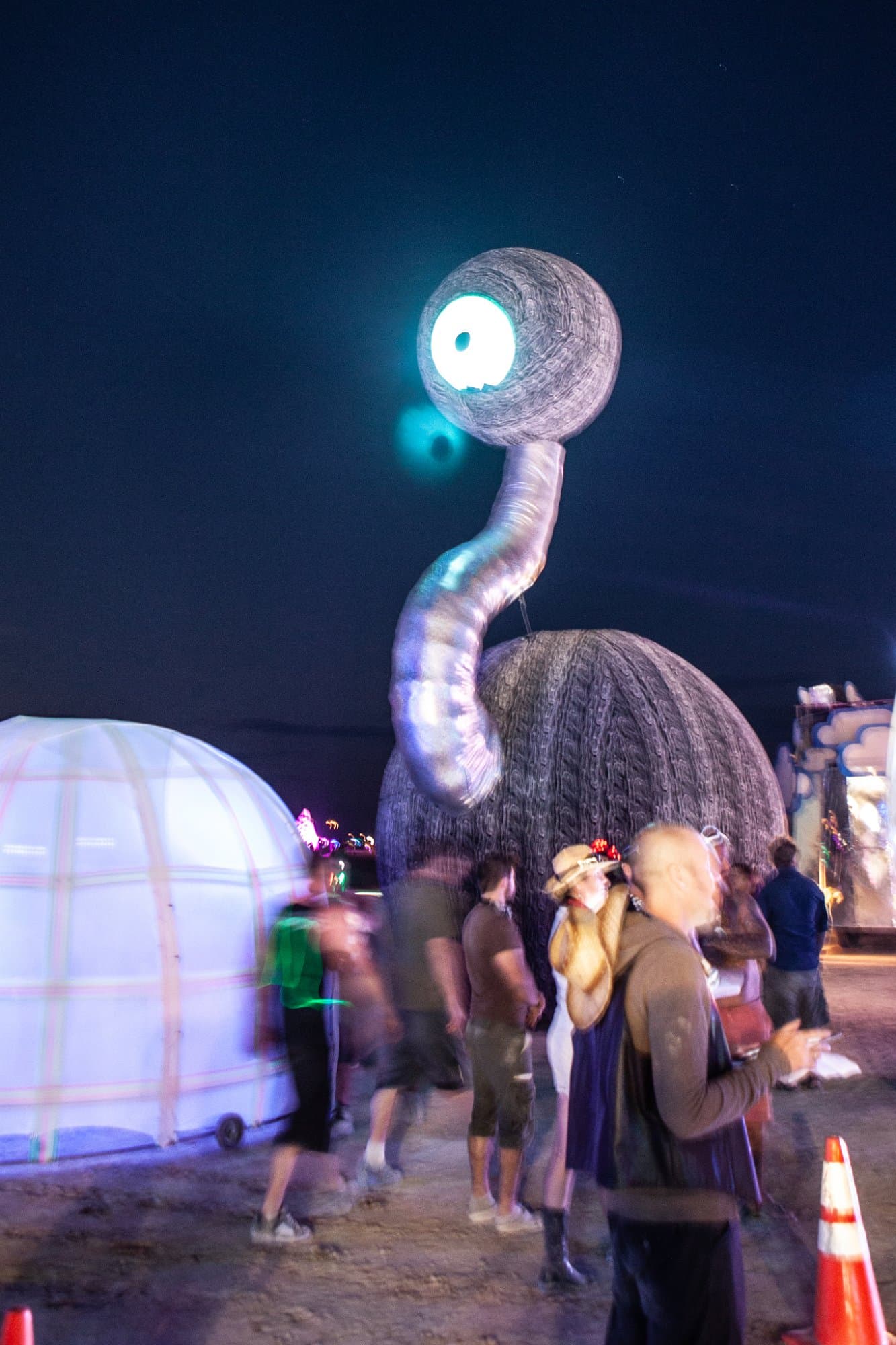 The neon art cars at night · 14/15