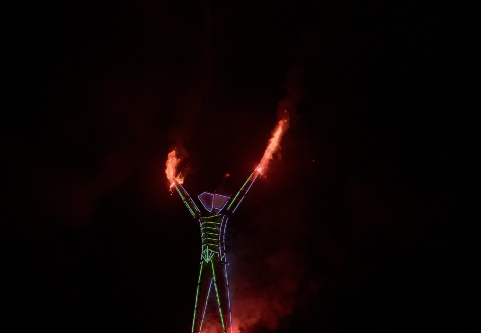 The Man, arms on fire · 6/16