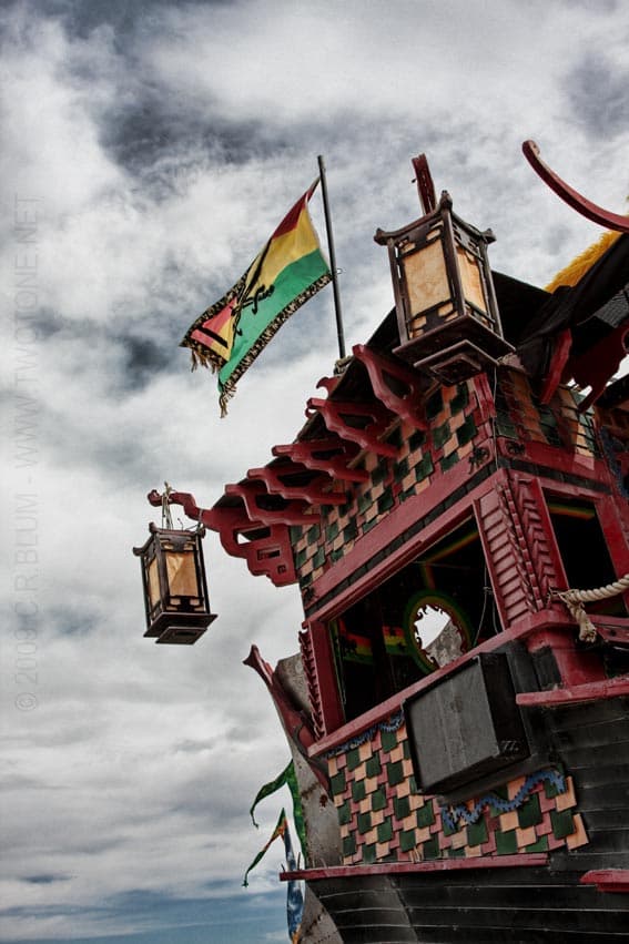 Junk-rig pagoda art car with hanging lanterns
