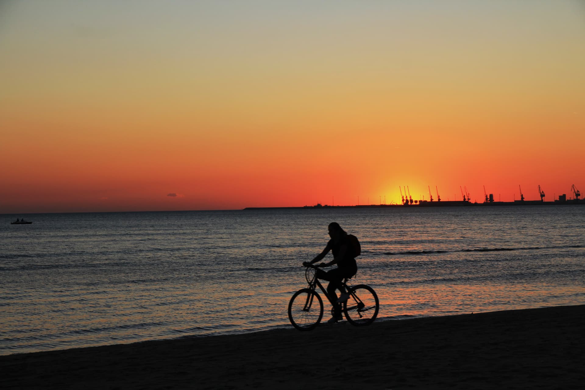 Sunset with port cranes, Durrës beach