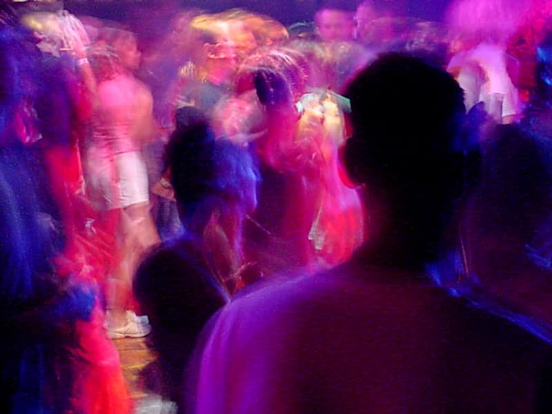 Rave dancers, two seconds of exposure