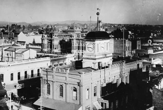 Temple Block with clock tower. Victorian buildings behind are - Amestoy Building and Uni…