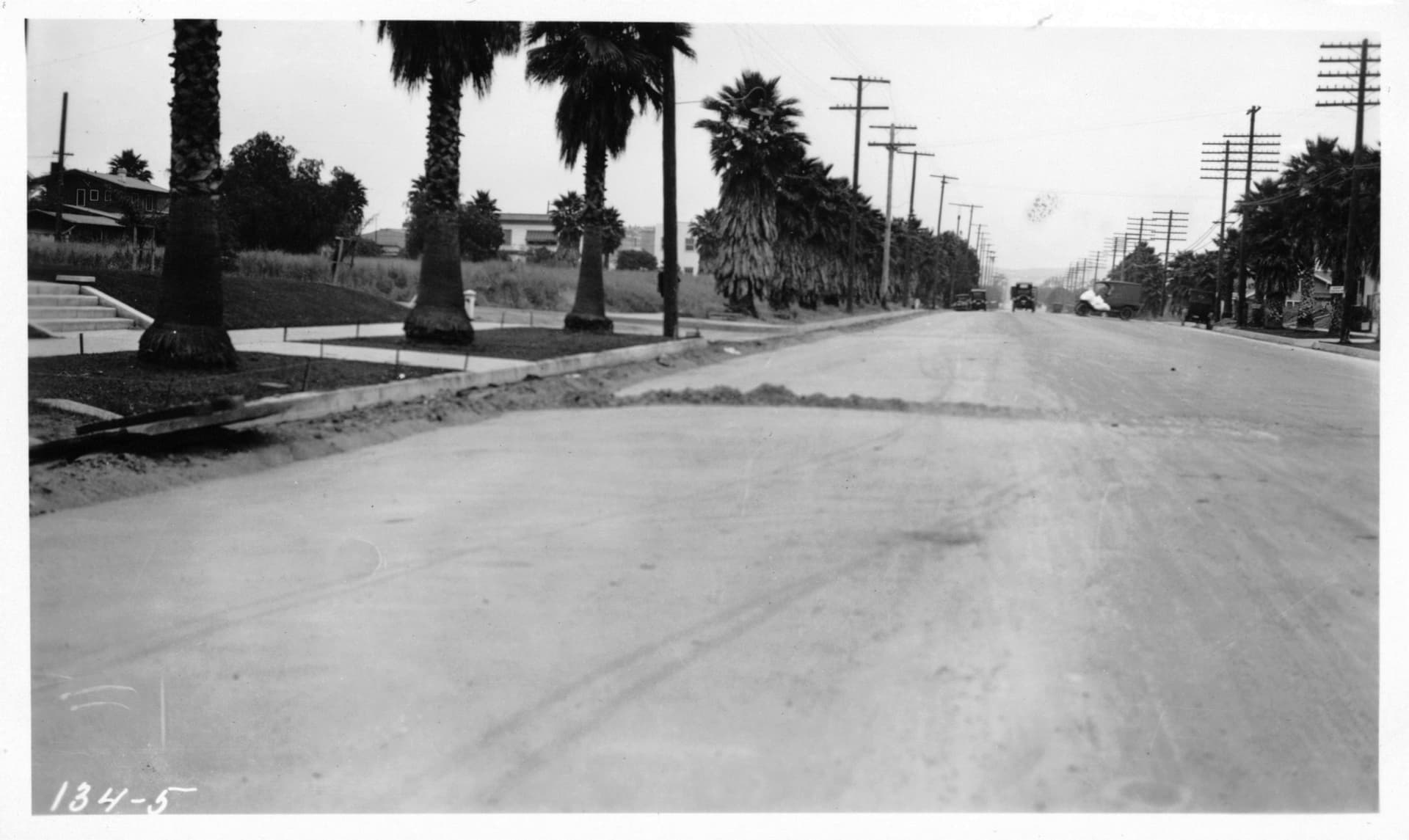 Cross excavation on Sunset Boulevard near Harvard Street showing high fill over cross tr…