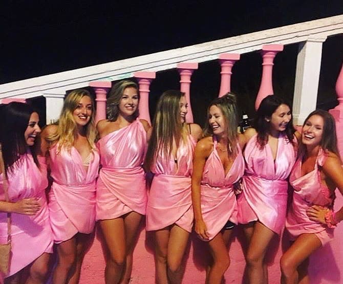 Every woman looks beautiful in a Pink Toga It's the Greek Party you don't want to miss.