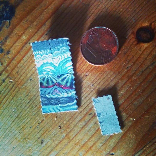 Sheet of perforated blotter paper for acid