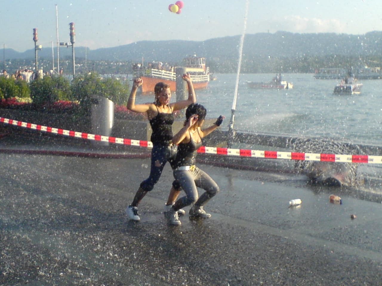 Ravers in the lake beside the parade route, 2007