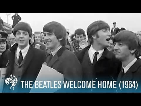 The Beatles return home to England from their first US tour