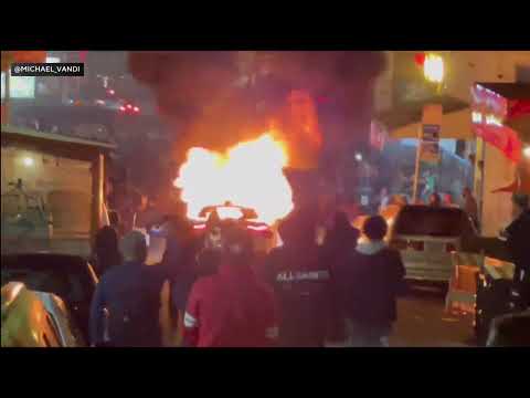 Waymo robotaxi burned by crowd in Chinatown