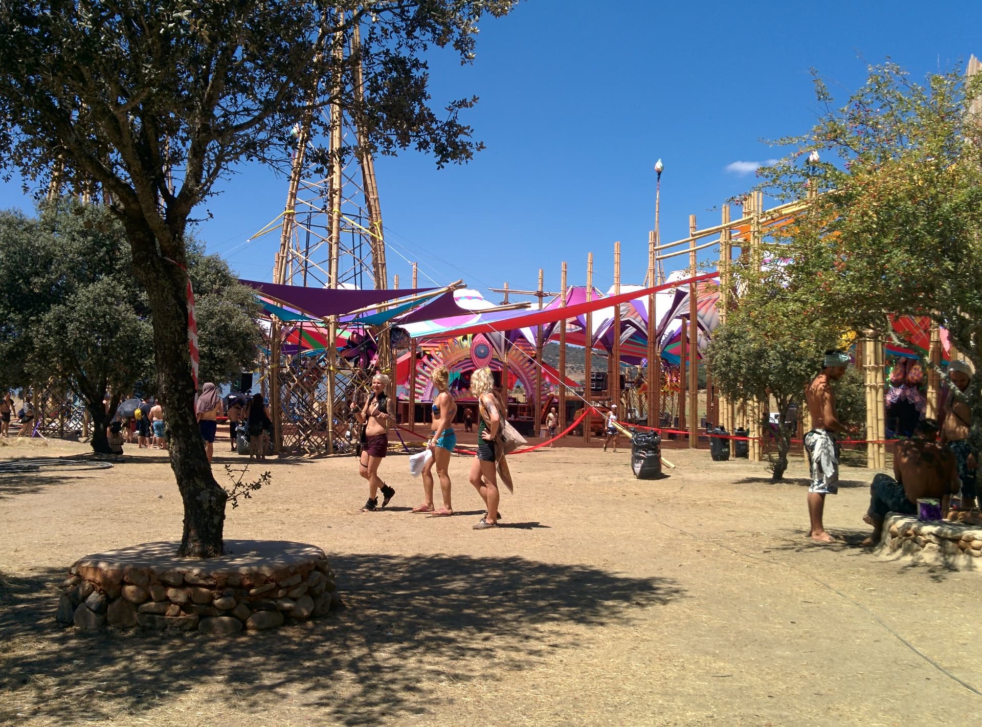 Walking past the stage in afternoon sun, Boom 2014