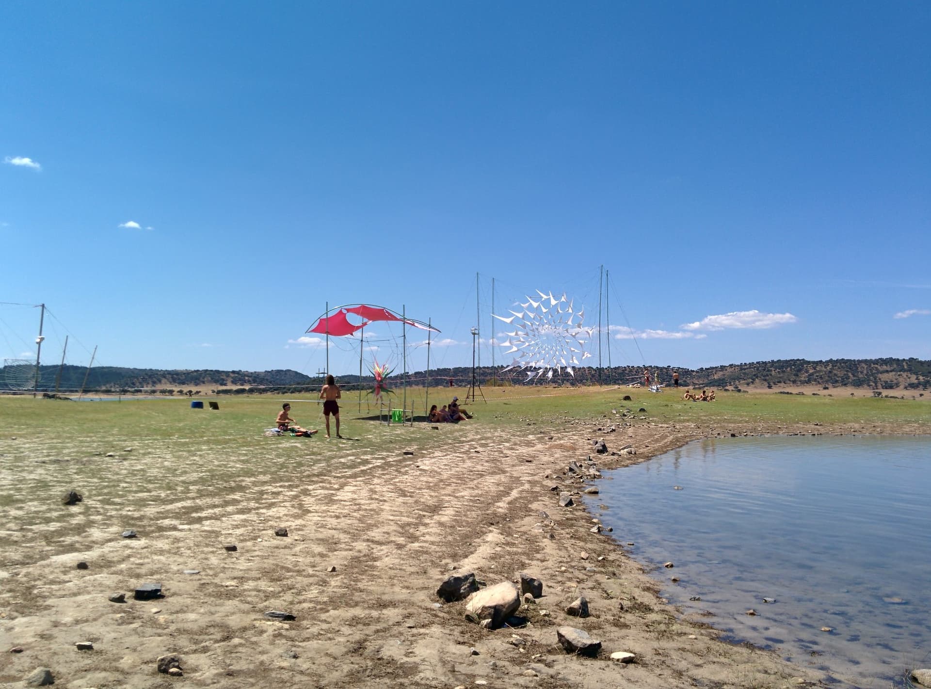 Parasol on the empty morning beach, Boom 2014