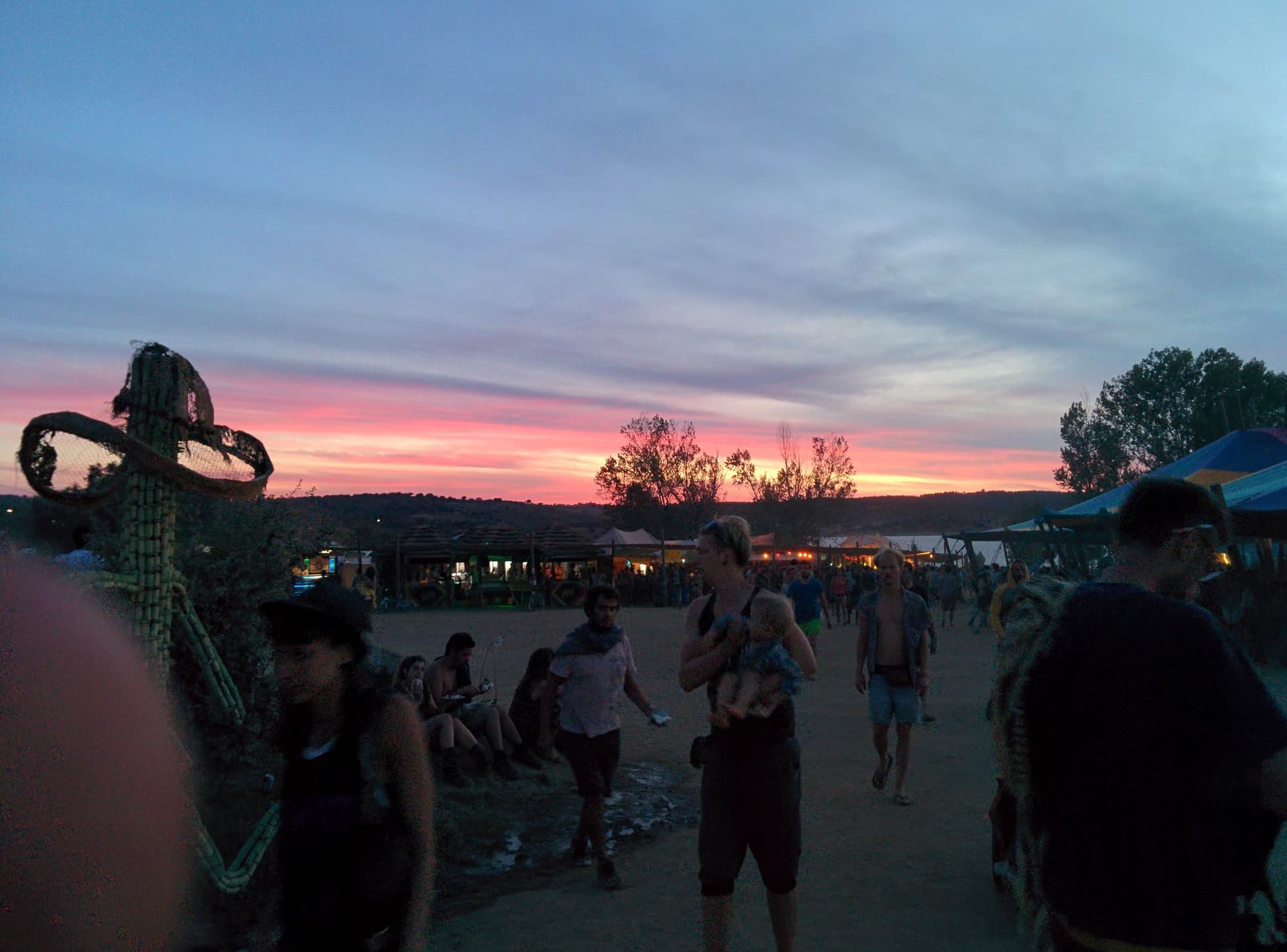 Crowd at dusk under a pink sky, Boom 2014