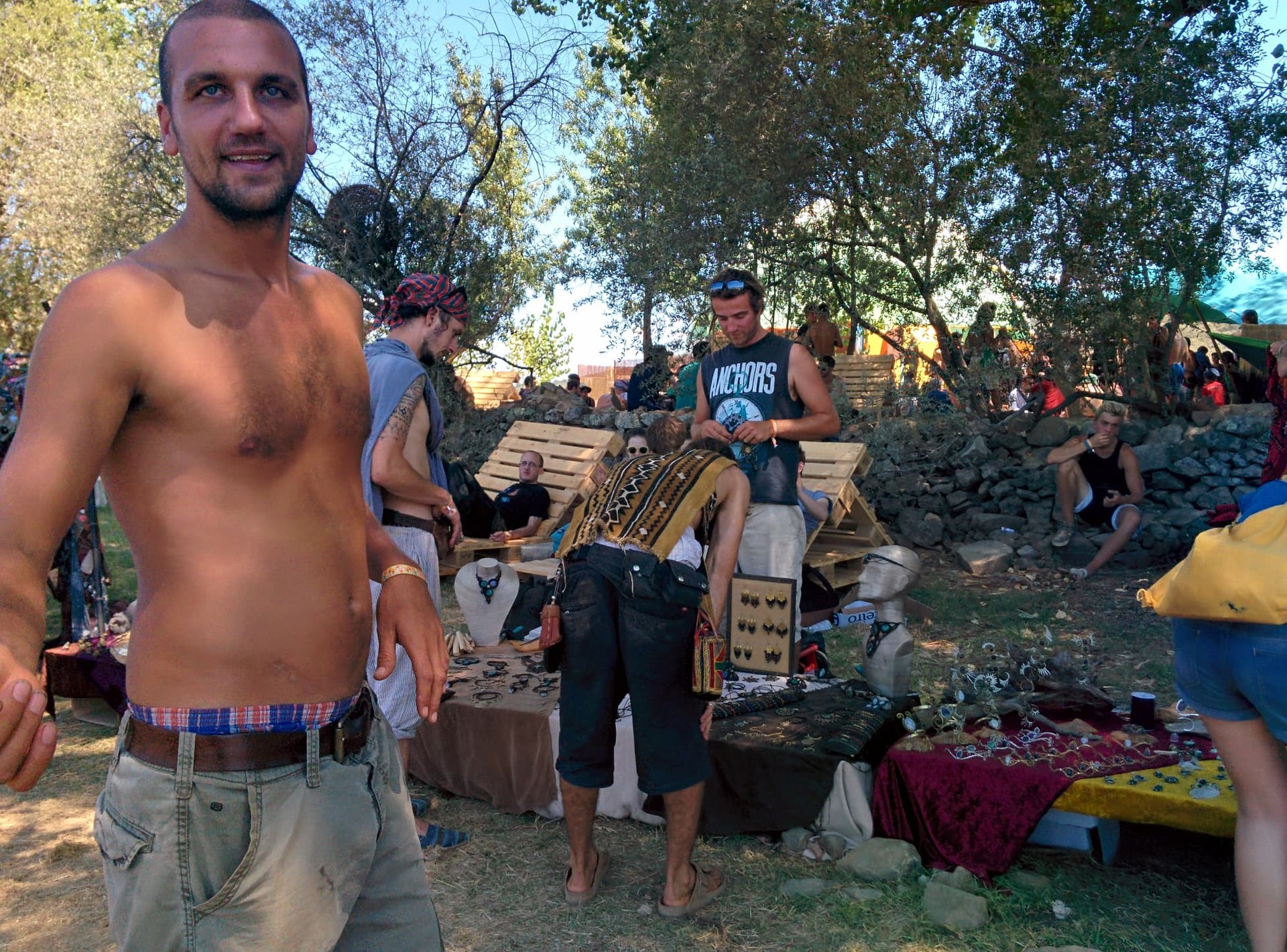 Browsing a market stall under the trees, Boom 2014