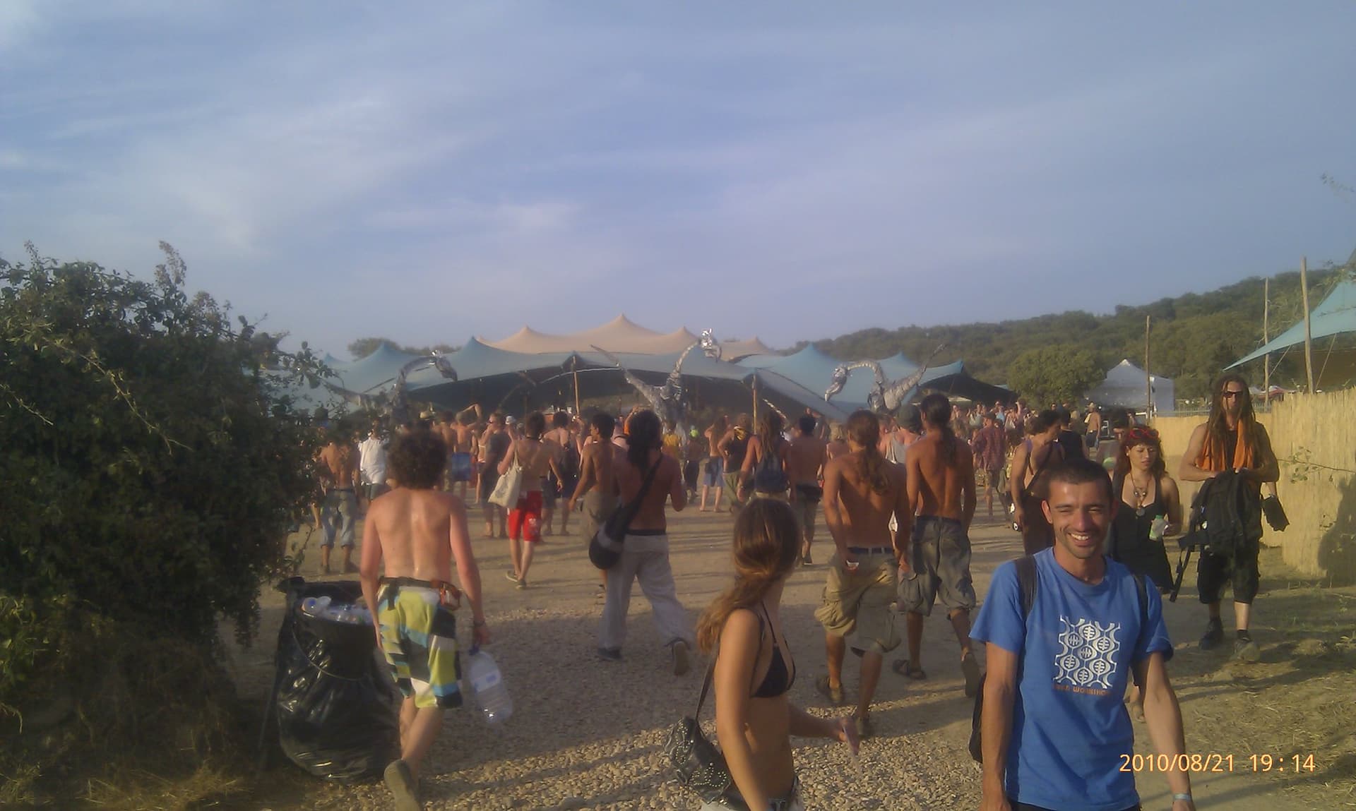 Walking the dusty main path through the site, Boom 2010