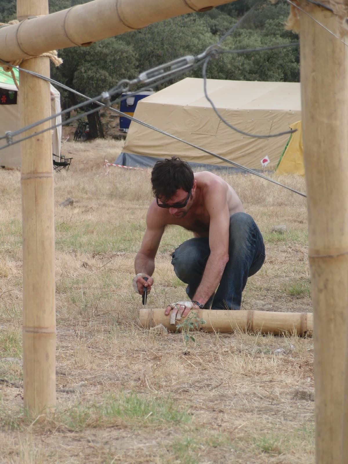Fixing a bamboo upright into the ground, Boom 2010