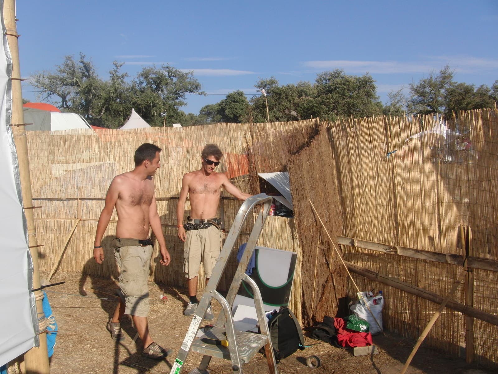 Crew building a reed screen enclosure, Boom 2010
