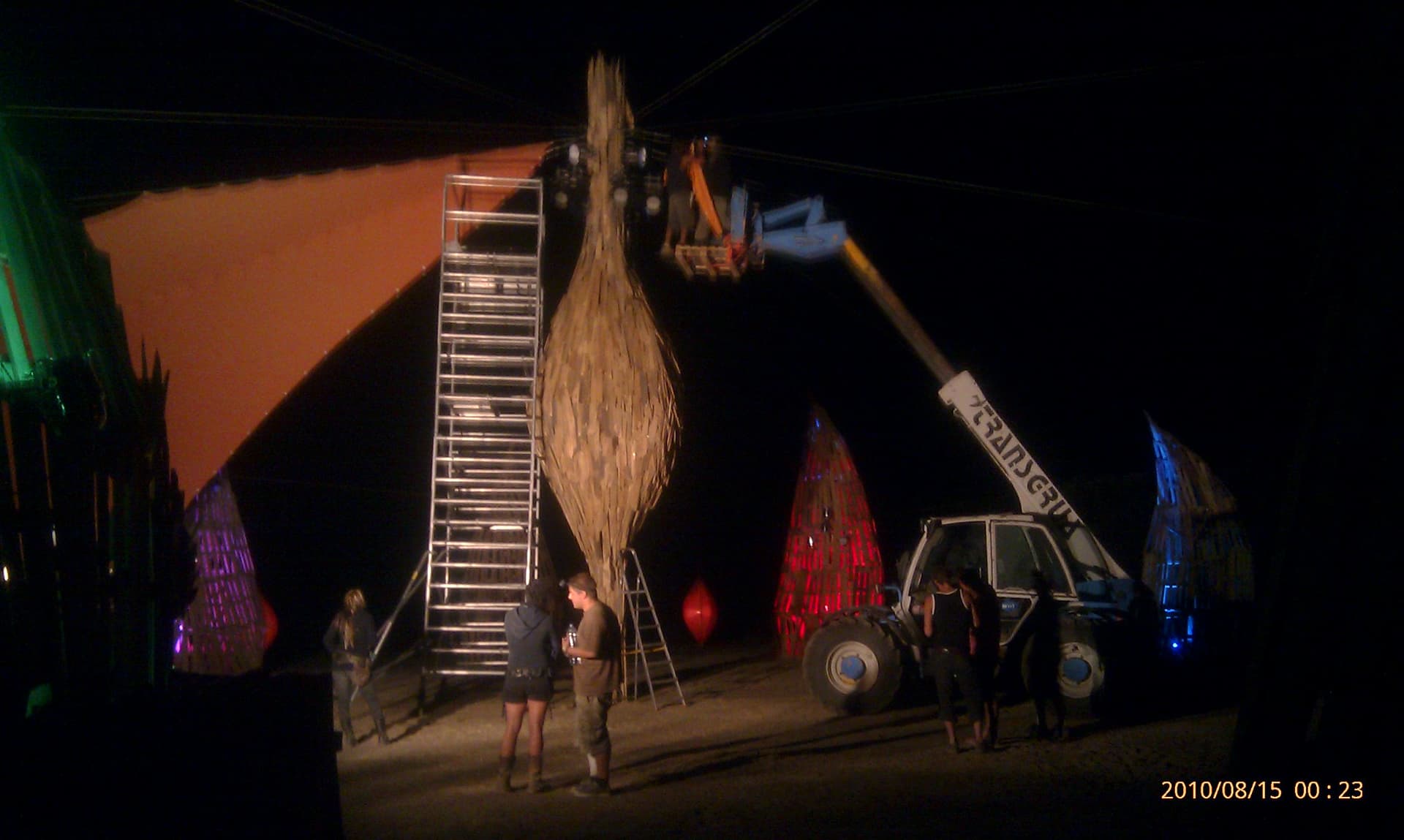 Crane lifting a woven tower panel into place, Boom 2010