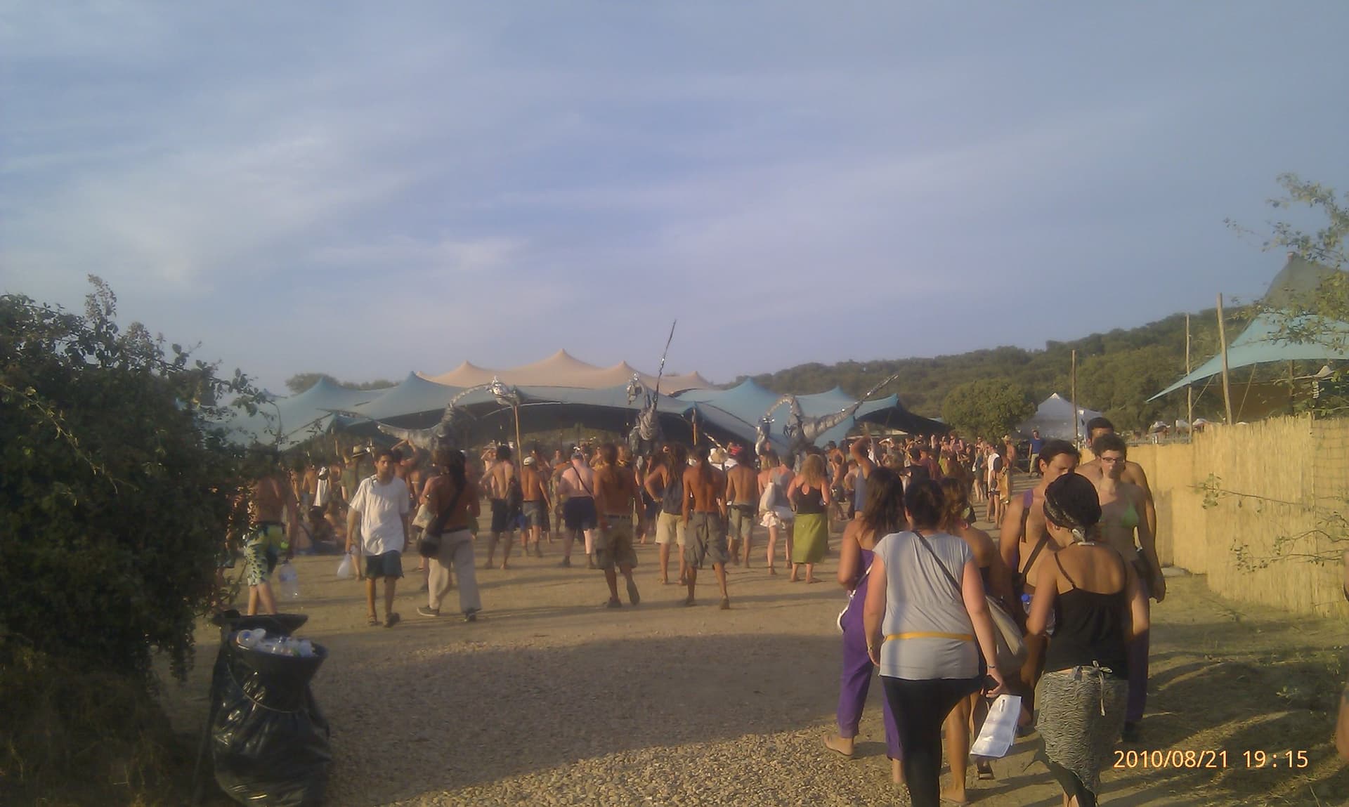 Crowds walking the site path at dusk, Boom 2010