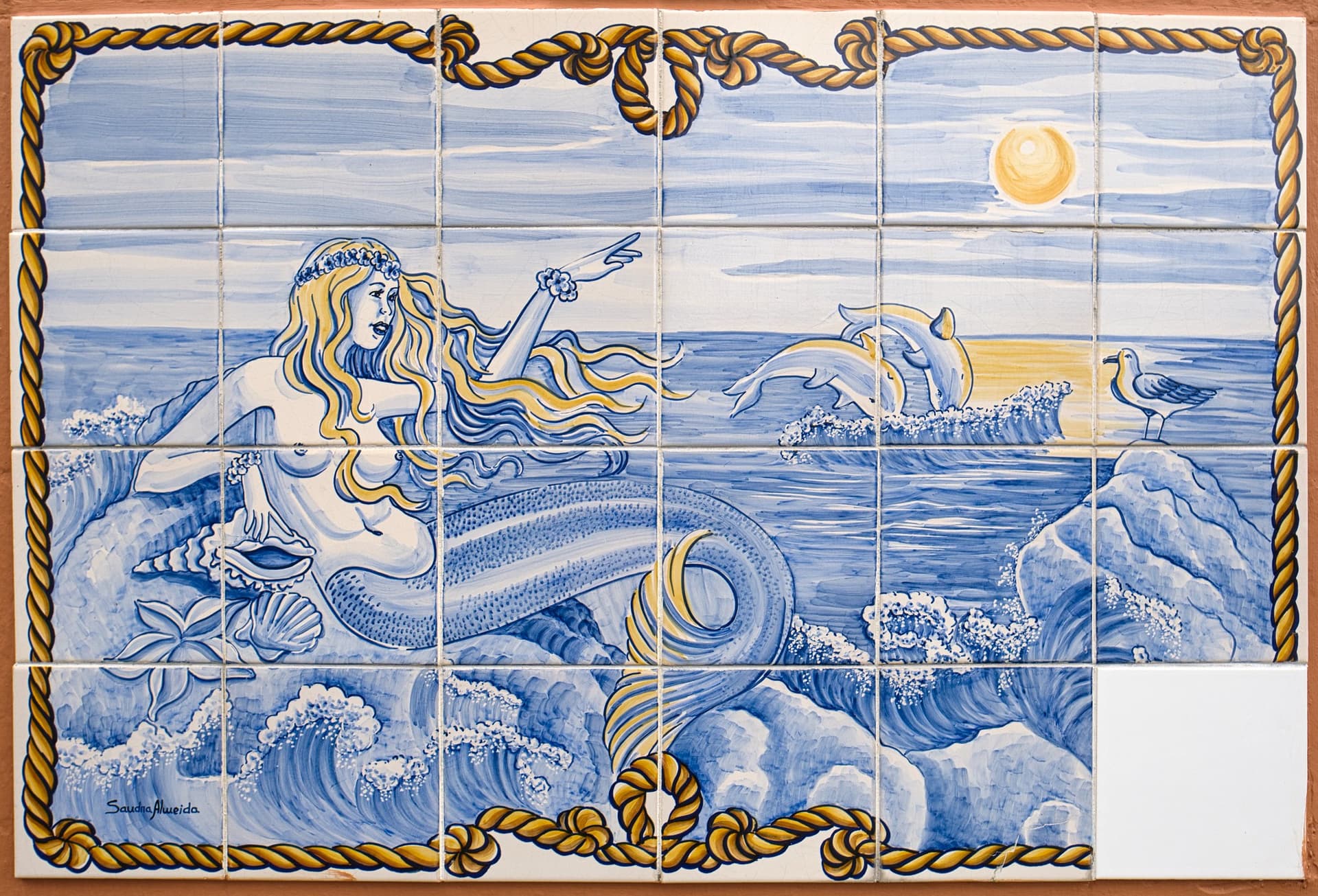Tiles with mermaid illustration