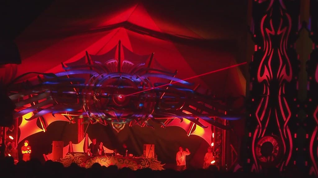 Red lit stage structure at night, Boom 2012