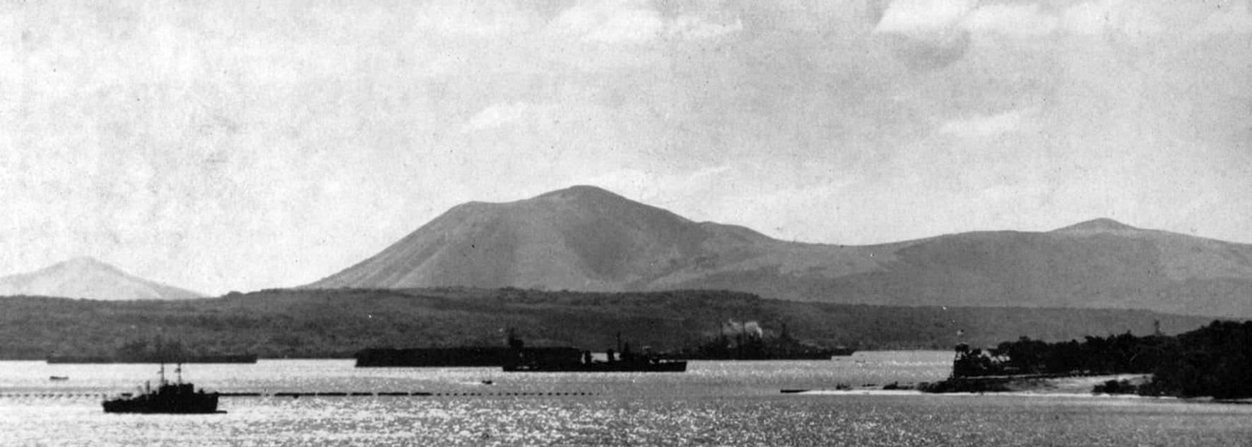USS Sangamon (ACV-26) at anchor in Havannah Bay, New Hebrides, in 1943