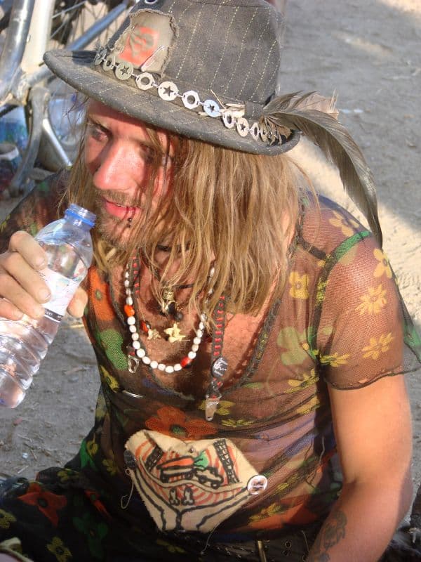Visitor drinking bottled water in the heat