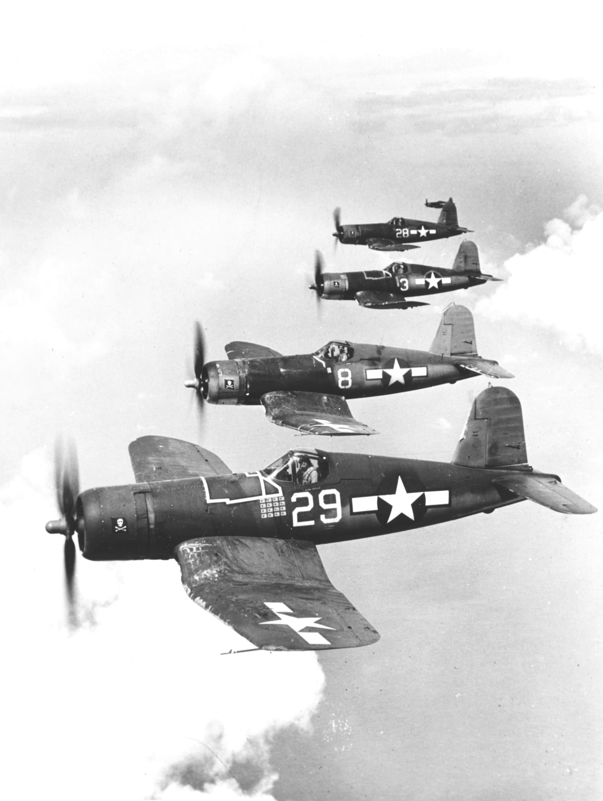 Vought F4U-1A Corsairs of VF-17 in flight, circa in March 1944 ( )