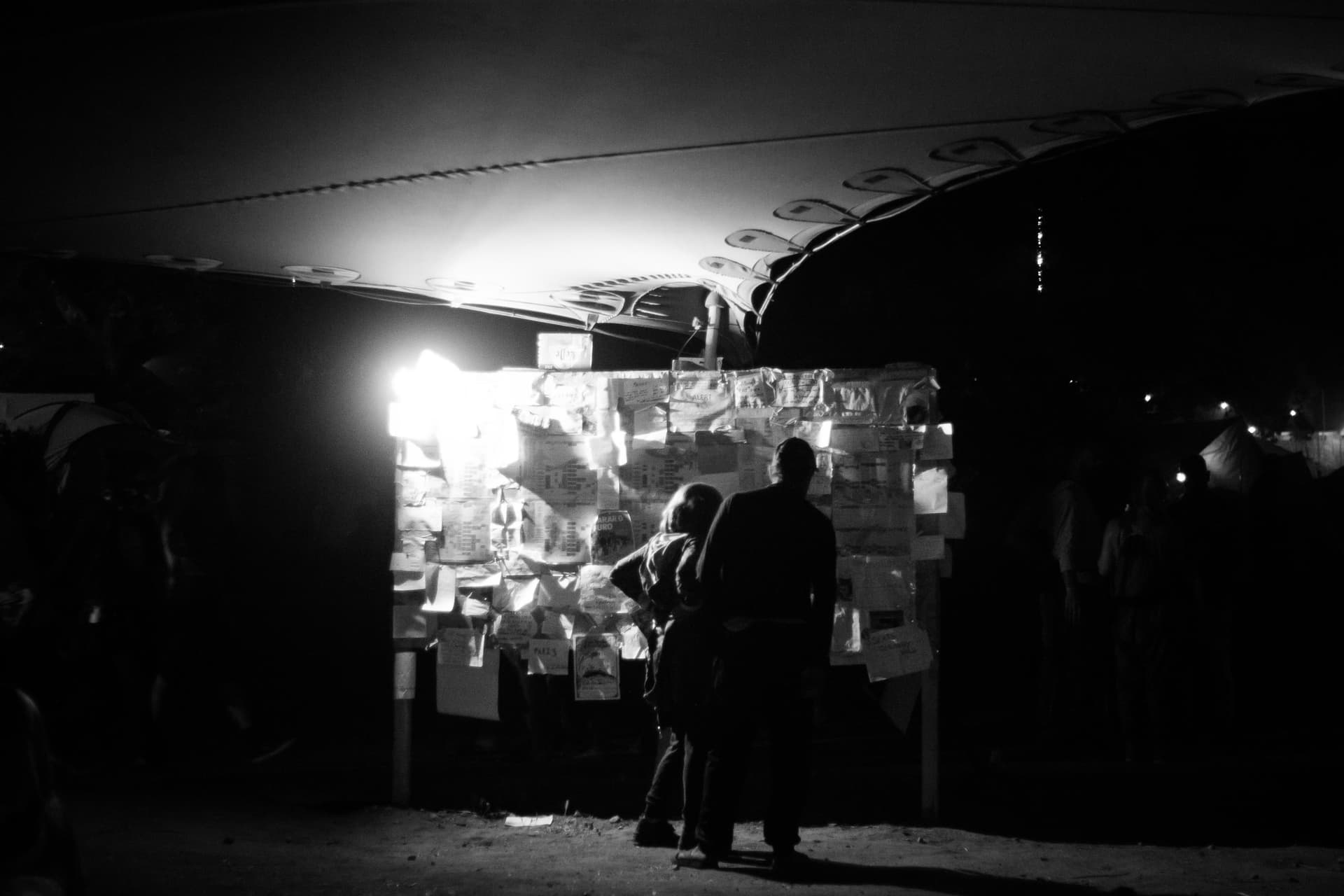 Lit noticeboard at night