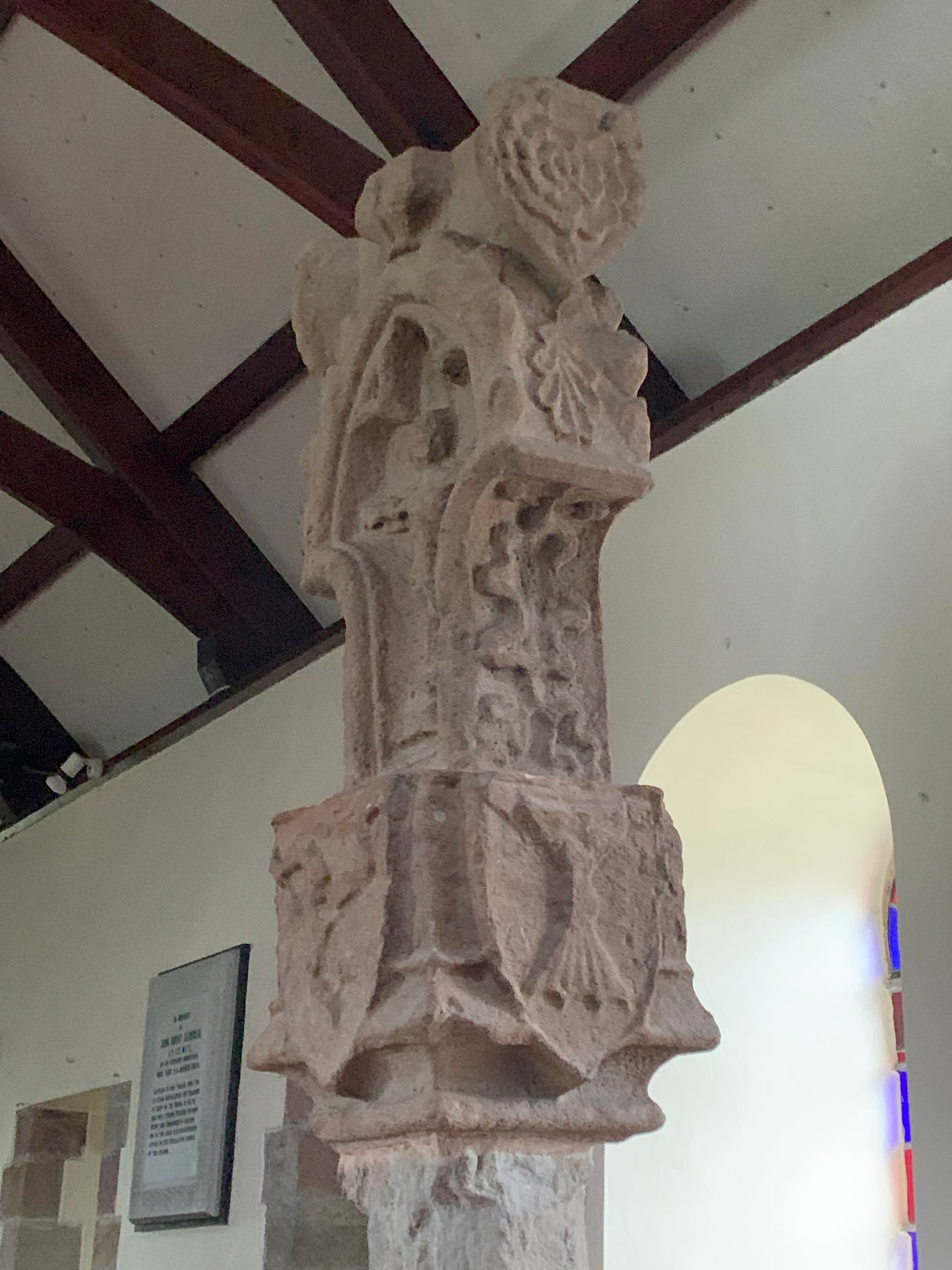 Isle of Man - Kirk Maiughold - St Maughold Pillar Cross 20240220 side with cruxifiction and side with shead...