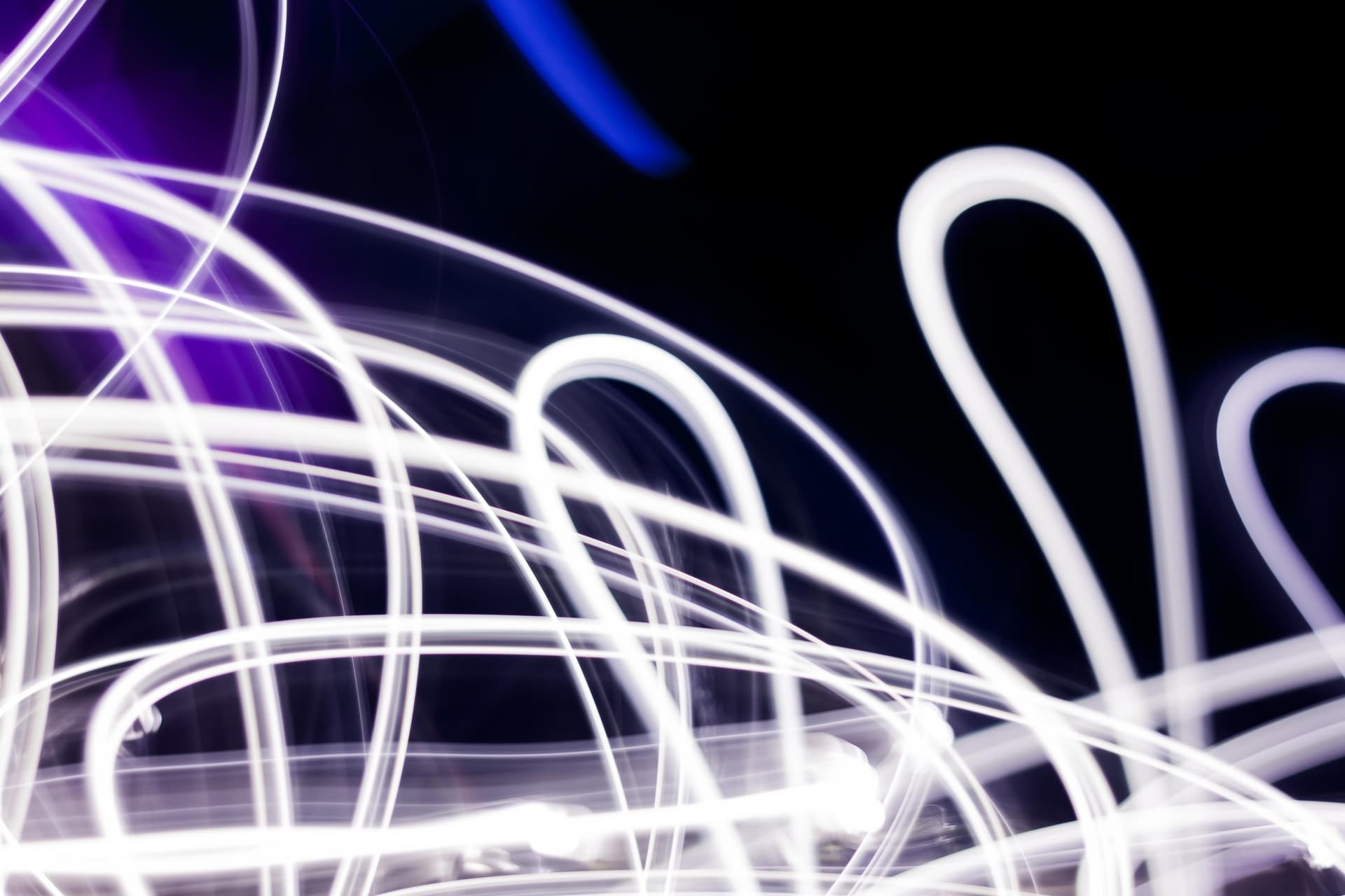 White light trails traced in the dark
