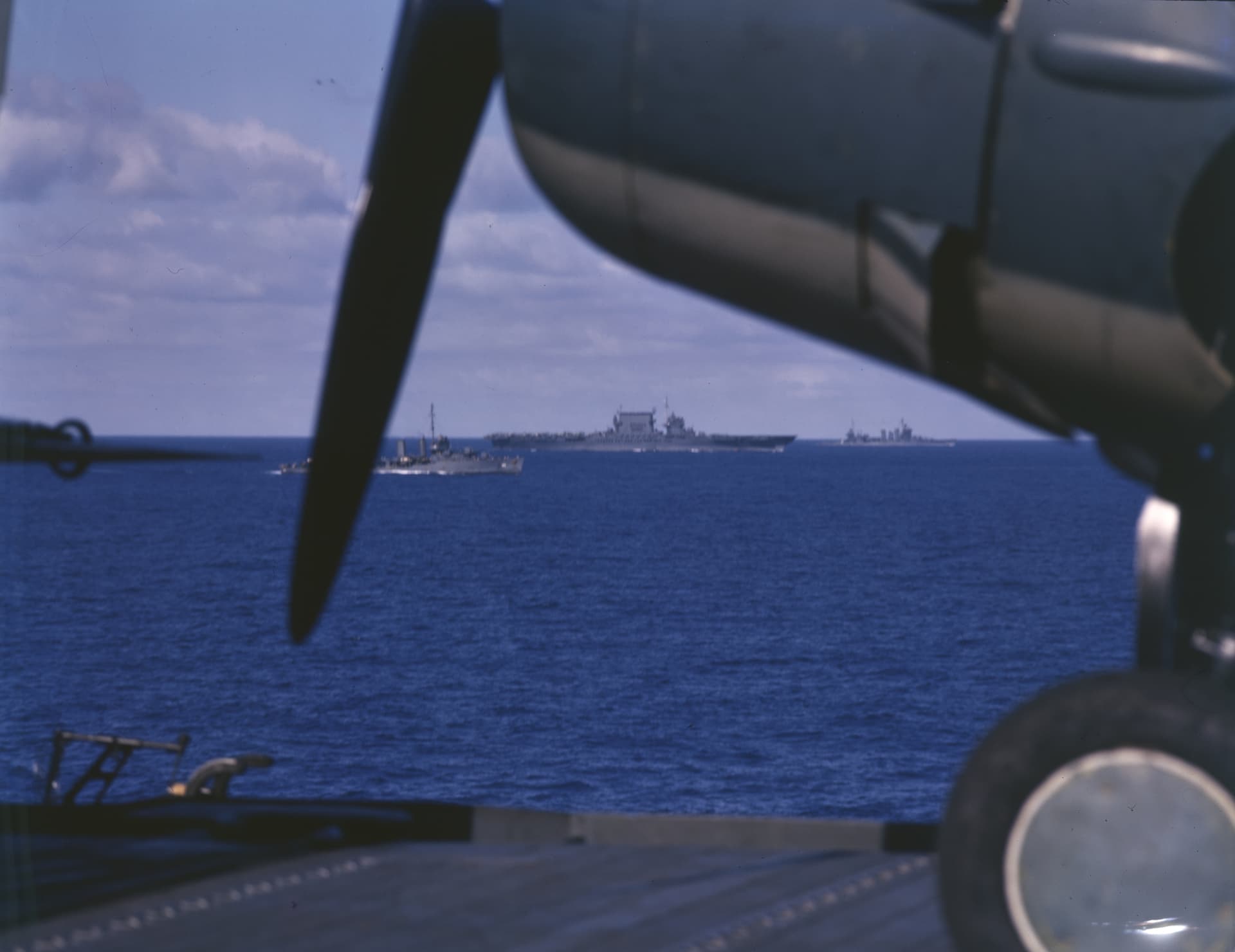 USS Saratoga (CV-3) underway with escorts in August 1942 (80-G-K-557)