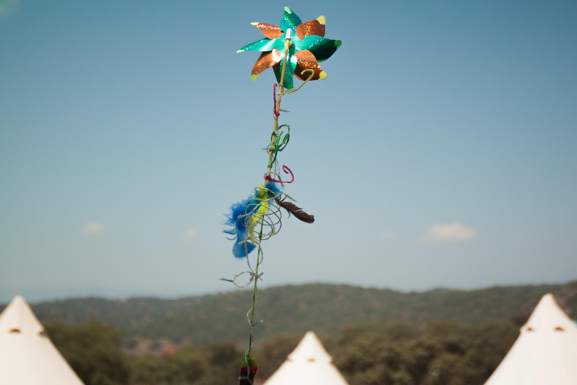 Decorated totem above the tipi camp